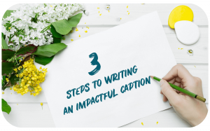 white sheet of paper on a white wood desk with the text 3 steps to writing an impactful caption on it and a hand holding a pencil to the piece of paper on the lower right, and white and yellow flowers on the upper left