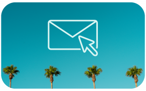 Photo of a blue sky with a row of palm trees at the bottom and a light green icon of a letter with an arrow pointing to it in the middle